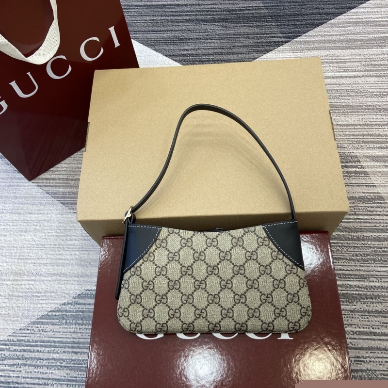 G*u*i top handle bags
